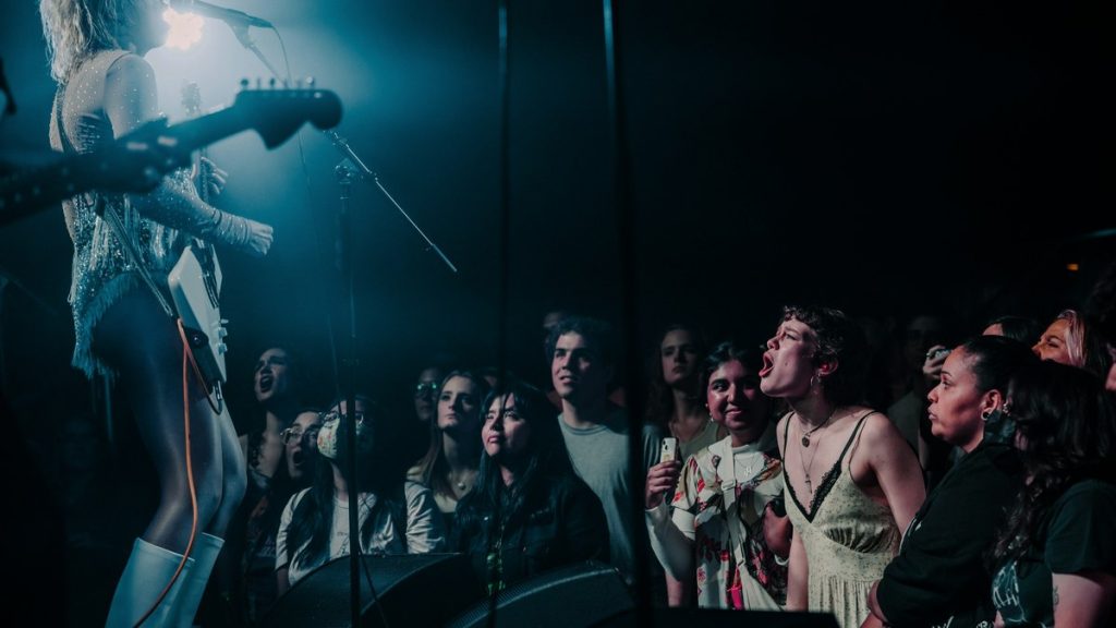 Fans pressed close to the stage at an intense club show
