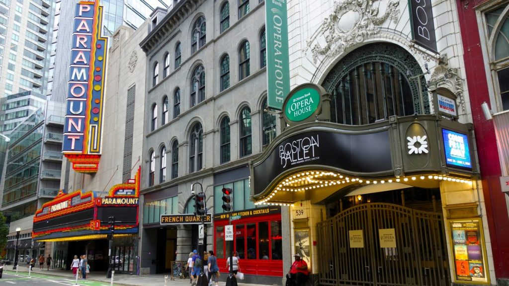 Historic theatre buildings on a Boston street, including the Paramount and Opera House